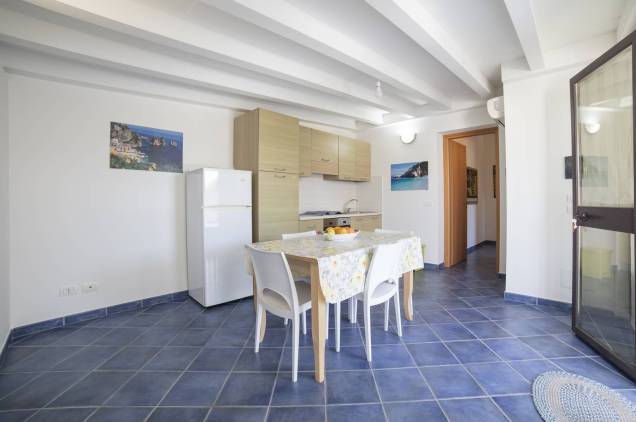 Spacious living room with kitchen